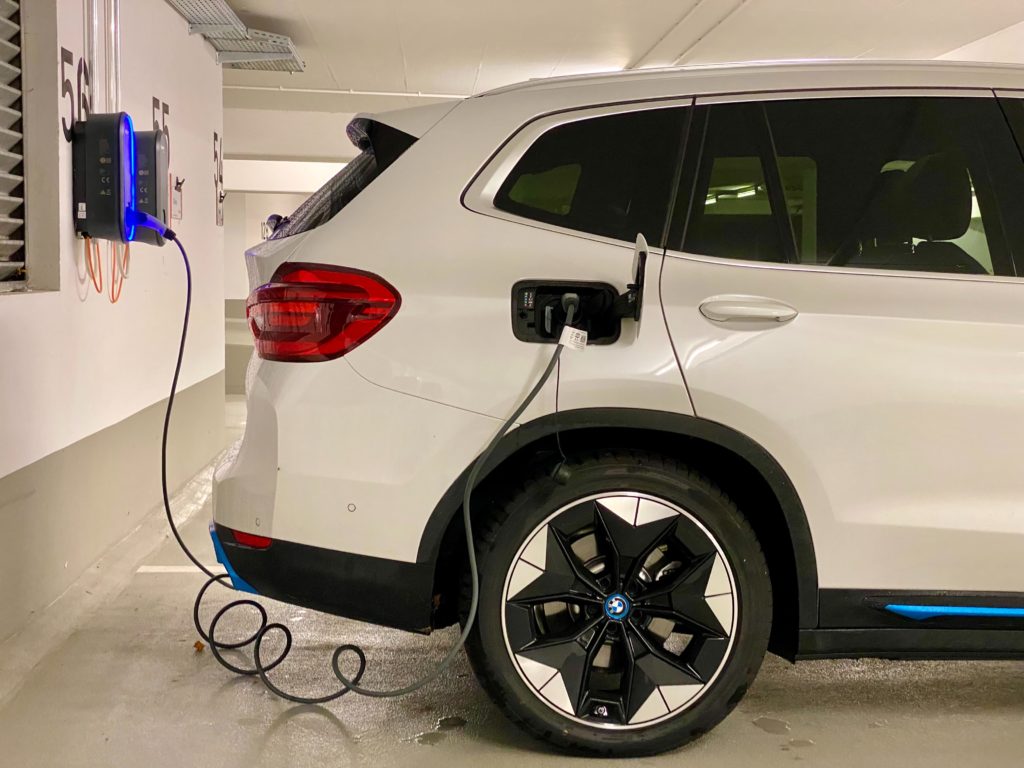 BMW i4 being charged. 