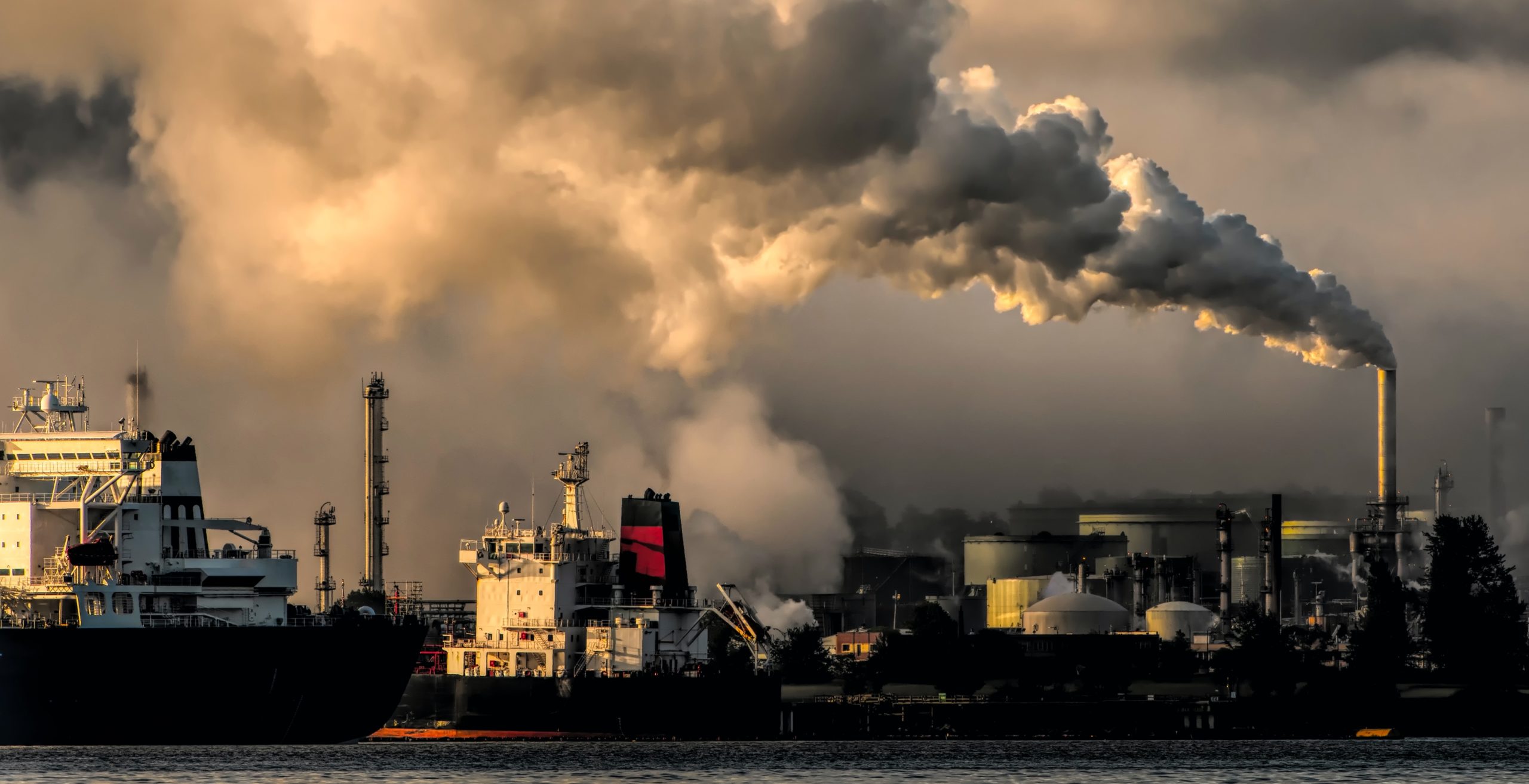 Coal plant with smoking chimneys